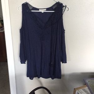 Top with open shoulders